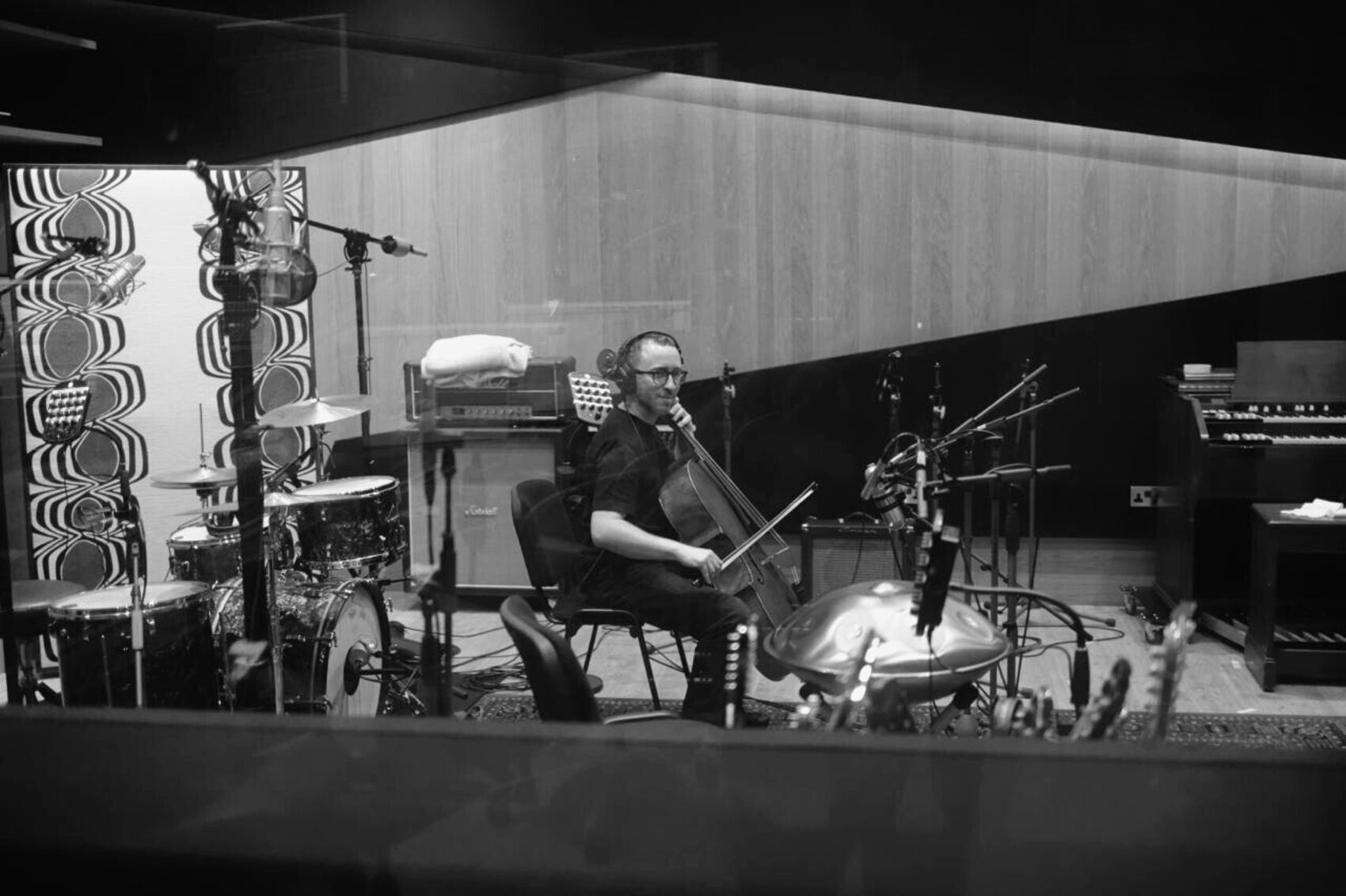 Three at the mixing desk